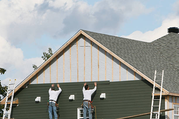 Professional Siding Installation technician working in Montpelier, VA